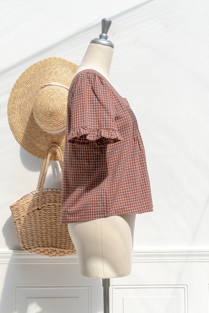 Mavis windowpane cotton blouse — side view with soft drape and flutter sleeve