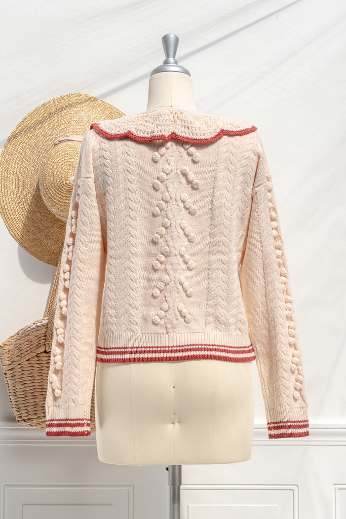 Piper scalloped-collar sweater — back view with clean rib knit and stripe hem