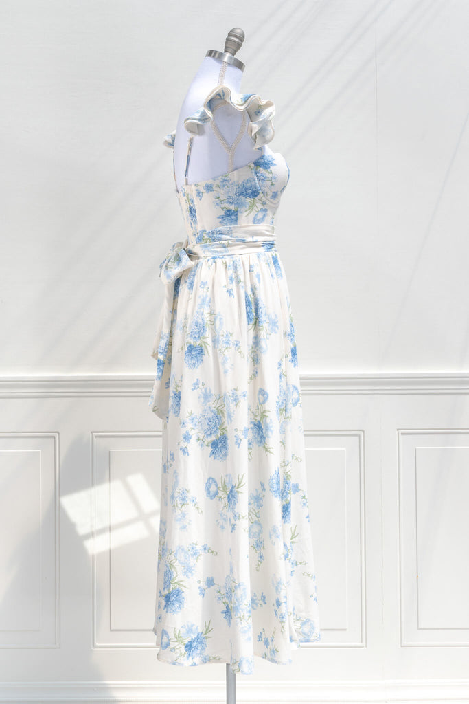 cottagecore dress in blue floral pattern. side view. 