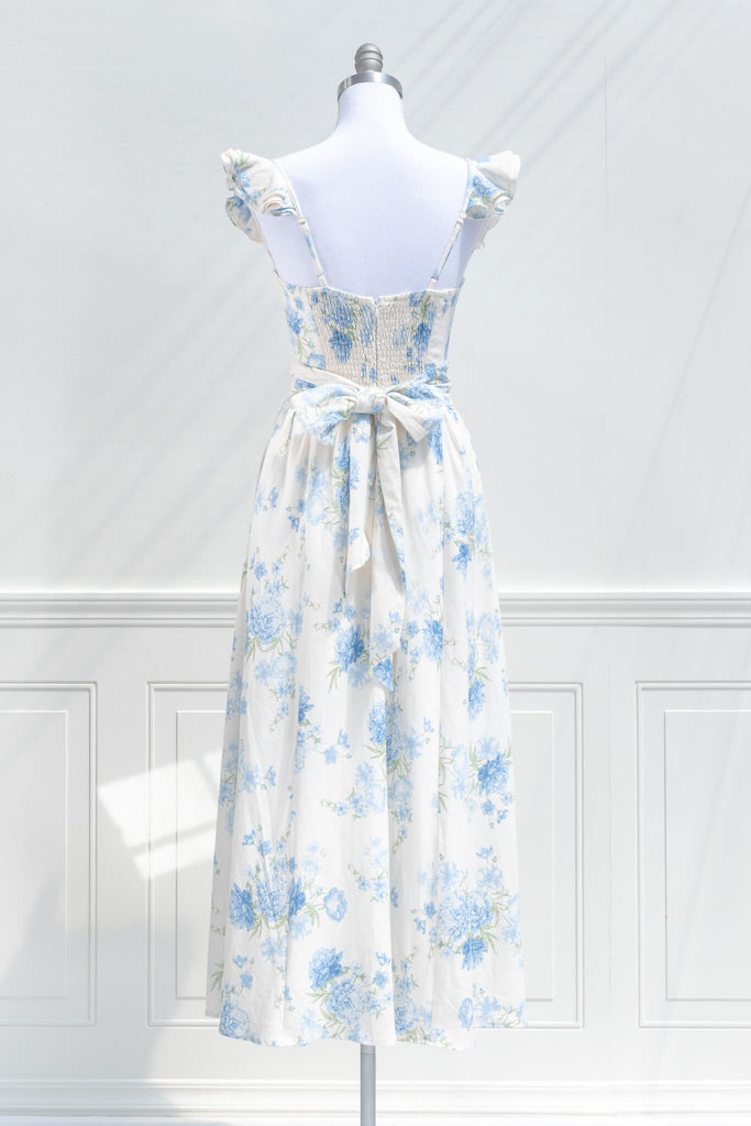 cottagecore dress in blue floral pattern. back view. 