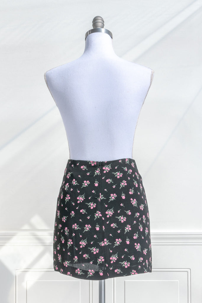 short skirts - a beautiful pink floral on black short skirt. back view. amantine. 