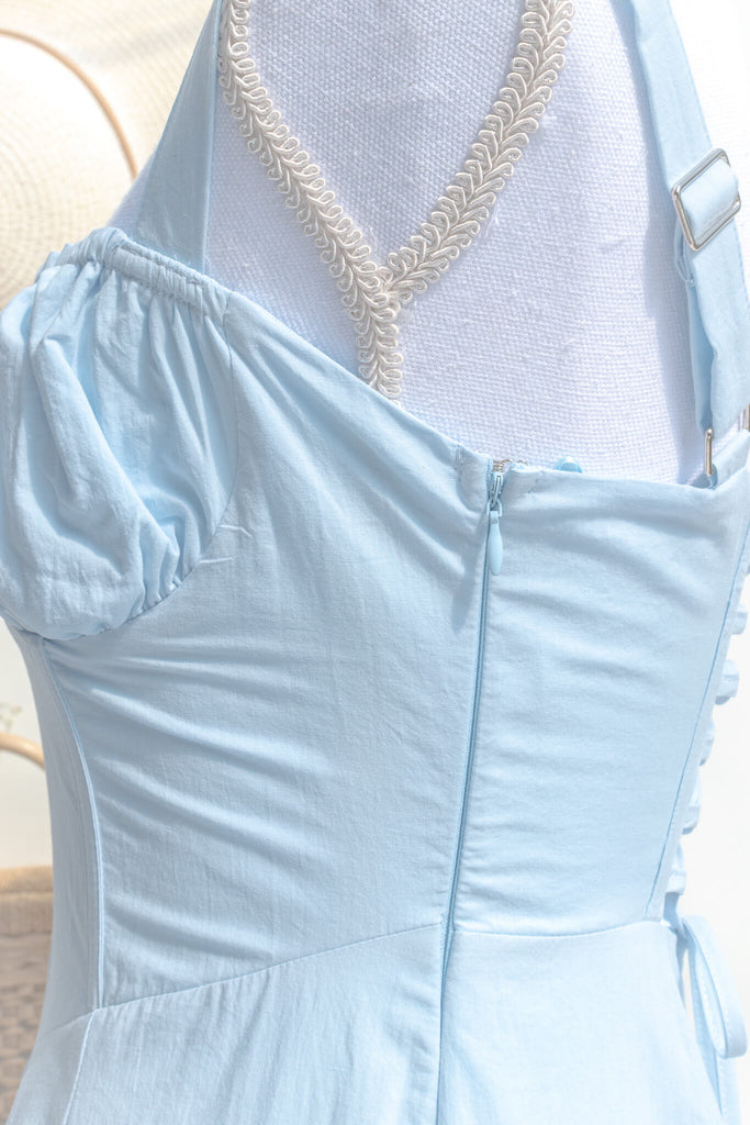 cottage core dresses - a cute long dress in blue cotton with a corset bustier and adjustable straps. up close fabric View. Amantine Boutique. 