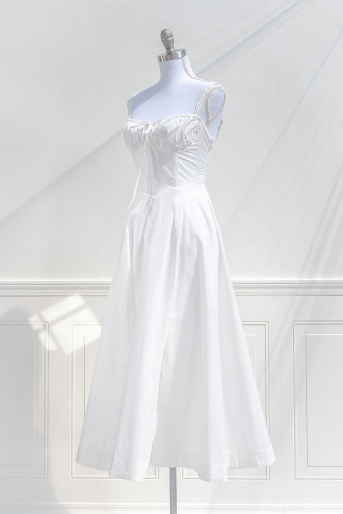 cottagecore dress - a beautiful long white cotton dress for spring. quarter side view. amantine boutique dresses. 