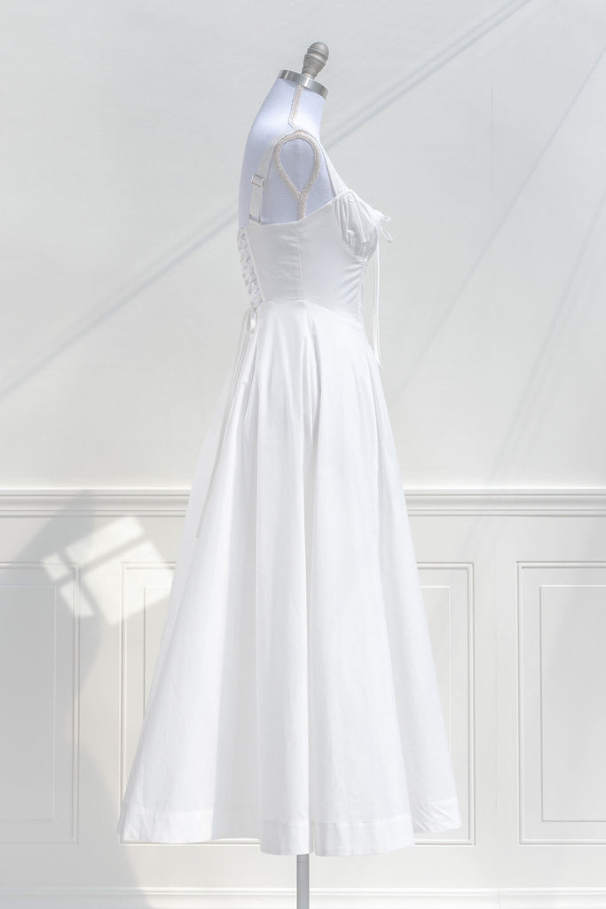 cottagecore dress - a beautiful long white cotton dress for spring. side view. amantine boutique dresses. 