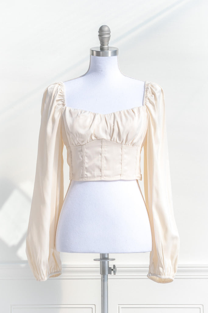 cottagecore outfits - a feminine top with long sleeves, bodice, and square neckline. front view. amantine. 