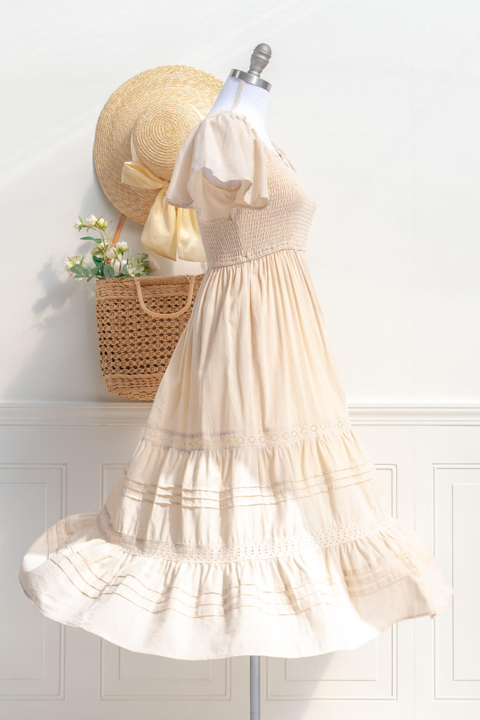 french dresses - cottage core style - feminine round neck, 3/4 sleeve, long dress for spring. cream color. side view. amantine. 