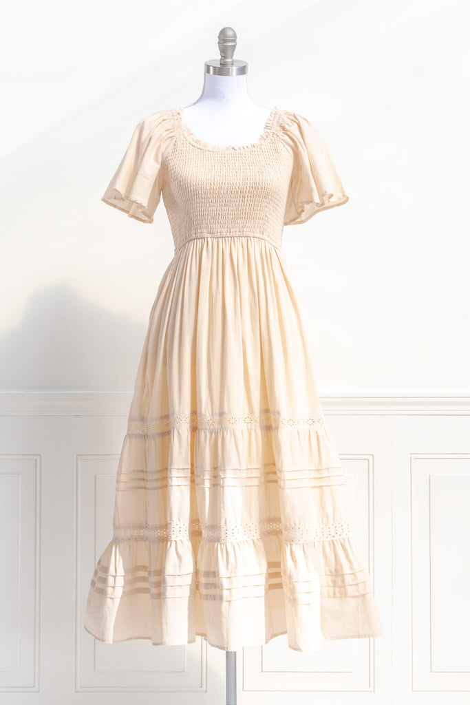 french dresses - cottage core style - feminine round neck, 3/4 sleeve, long dress for spring. cream color. front view. amantine. 