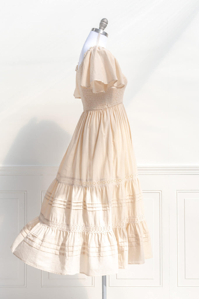 french dresses - cottage core style - feminine round neck, 3/4 sleeve, long dress for spring. cream color. hard side view. amantine. 