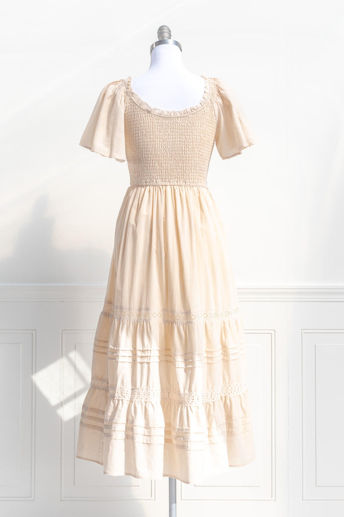 french dresses - cottage core style - feminine round neck, 3/4 sleeve, long dress for spring. cream color. back view. amantine. 