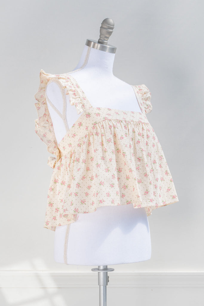 cottagecore outfits - feminine top in a lovely floral pattern.  quarter view. amantine boutique.