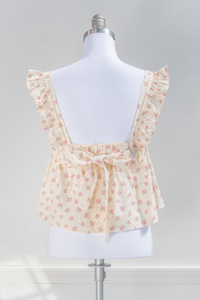 cottagecore outfits - feminine top in a lovely floral pattern.  back view. amantine boutique.