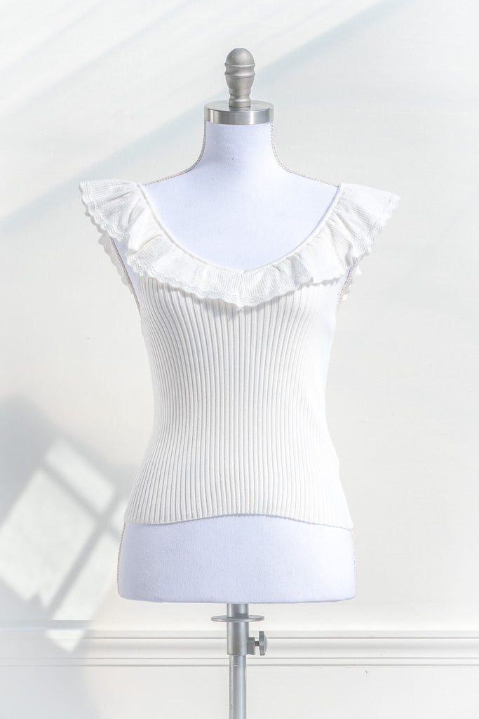 cottagecore outfits - a cottage core feminine top in french style. frilled neckline, sleeveless, and ribbed knit bodice in white. front view - amantine.