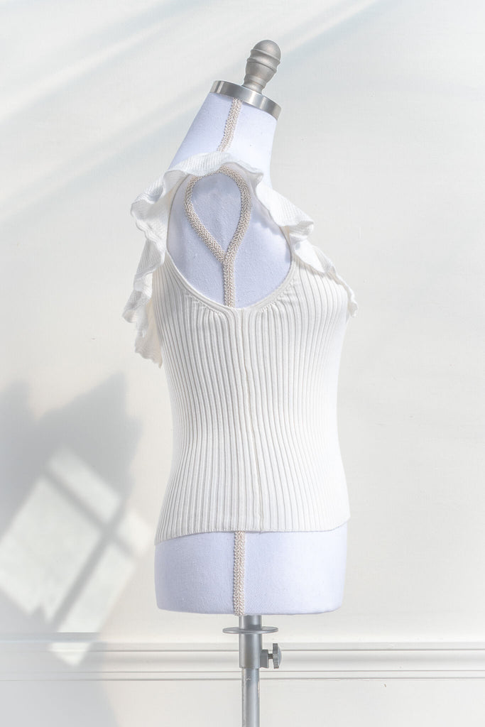 cottagecore outfits - a cottage core feminine top in french style. frilled neckline, sleeveless, and ribbed knit bodice in white. side view - amantine.