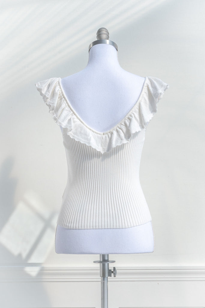 cottagecore outfits - a cottage core feminine top in french style. frilled neckline, sleeveless, and ribbed knit bodice in white. back view - amantine.