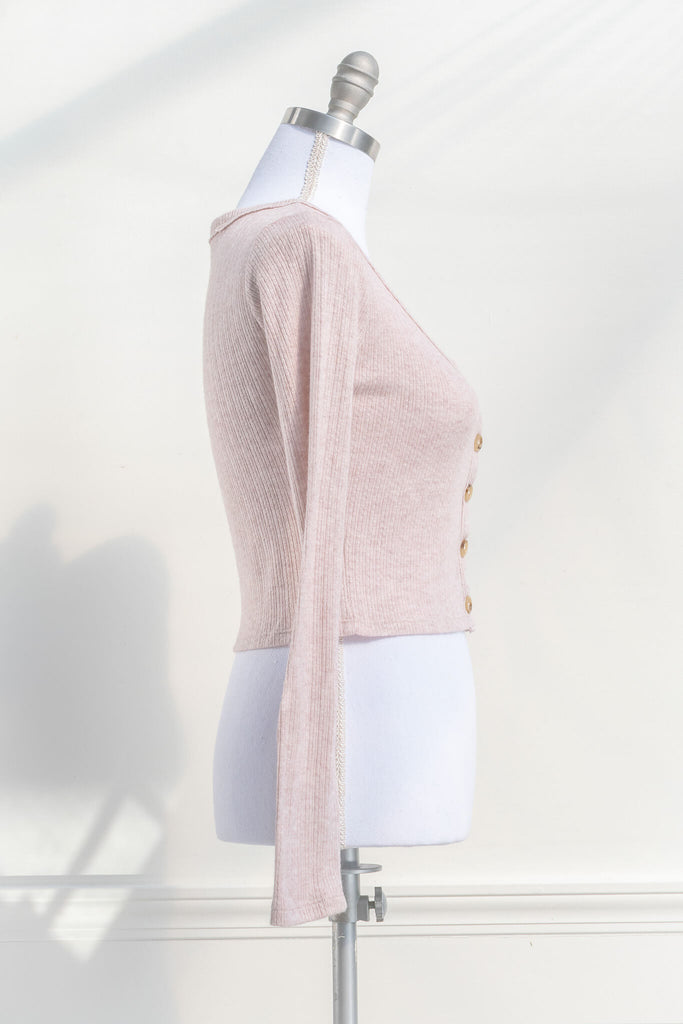 cottagecore outfits - a pink button down cardigan for spring. cottage core style. side view. amantine. 