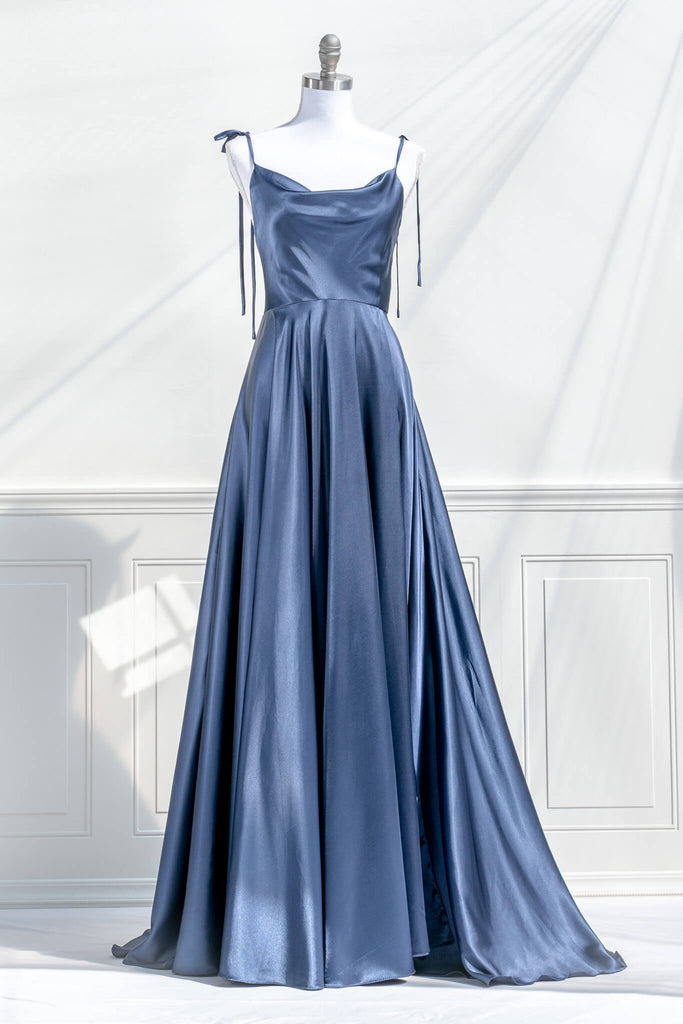 boutique dresses french style - a long blue satin prom dress, with a cowl neckline, spaghetti straps, and a stunning full sweeping gown skirt. front view. amantine.
