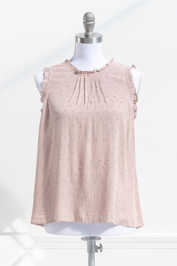 feminine tops for romantic outfits. a french girl style feminine top in taupe color. front view. 