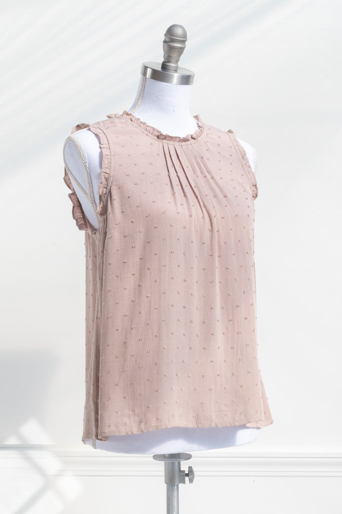 feminine tops for romantic outfits. a french girl style feminine top in taupe color. quarter side view. 