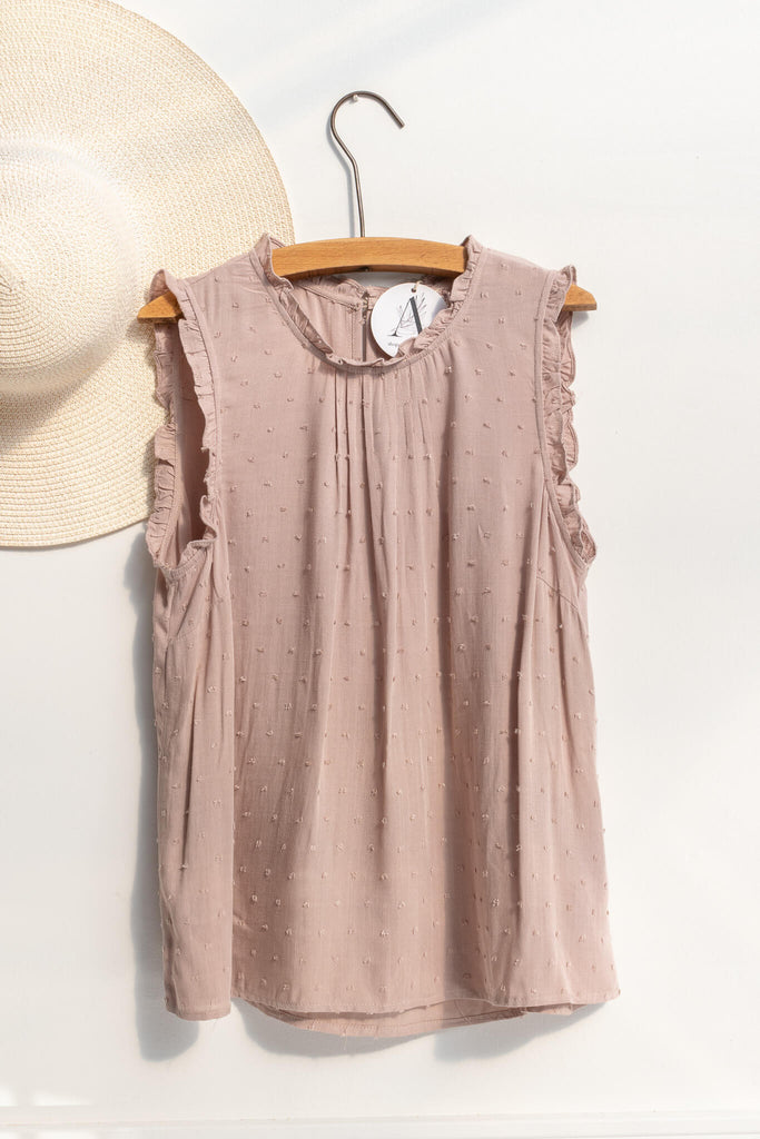 feminine tops for romantic outfits. a french girl style feminine top in taupe color. front view. 