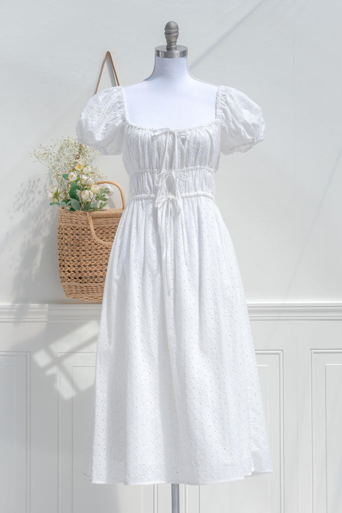 cottagecore dress - a chemise a la reine or marie antoinette style dress. square neckline, puff sleeves, midi length. front view. 