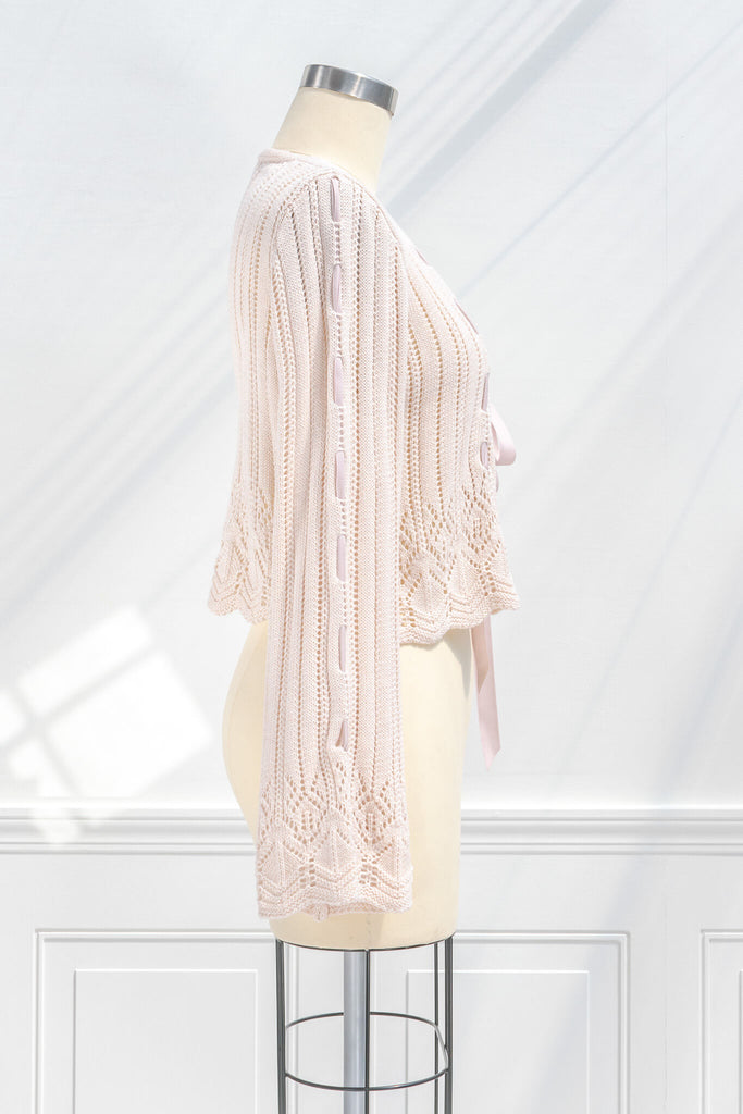 pink outfits - a beautiful and unique front tie cardigan with oversized sleeves and delicate knit details. side view. amantine. 