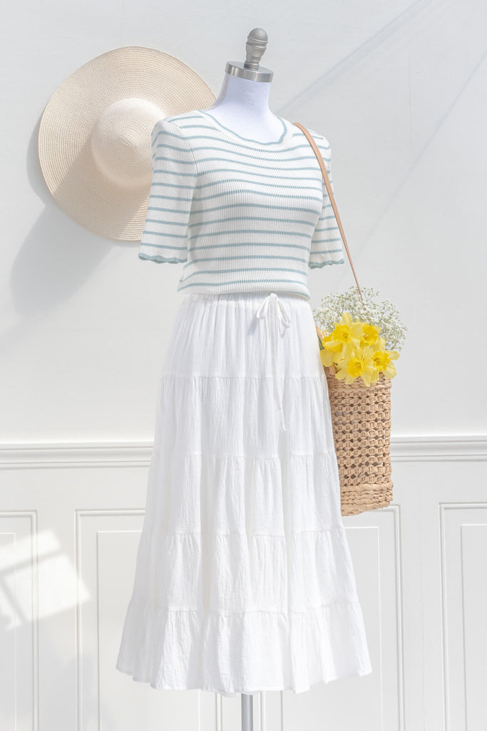 cottagecore outfit with a light sweater and skirt. outfits for spring. 