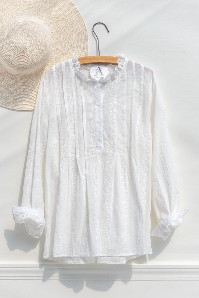 feminine blouse for work - cottagecore inspired outfit - long sleeve white shirt. on hanger view. amantine. 