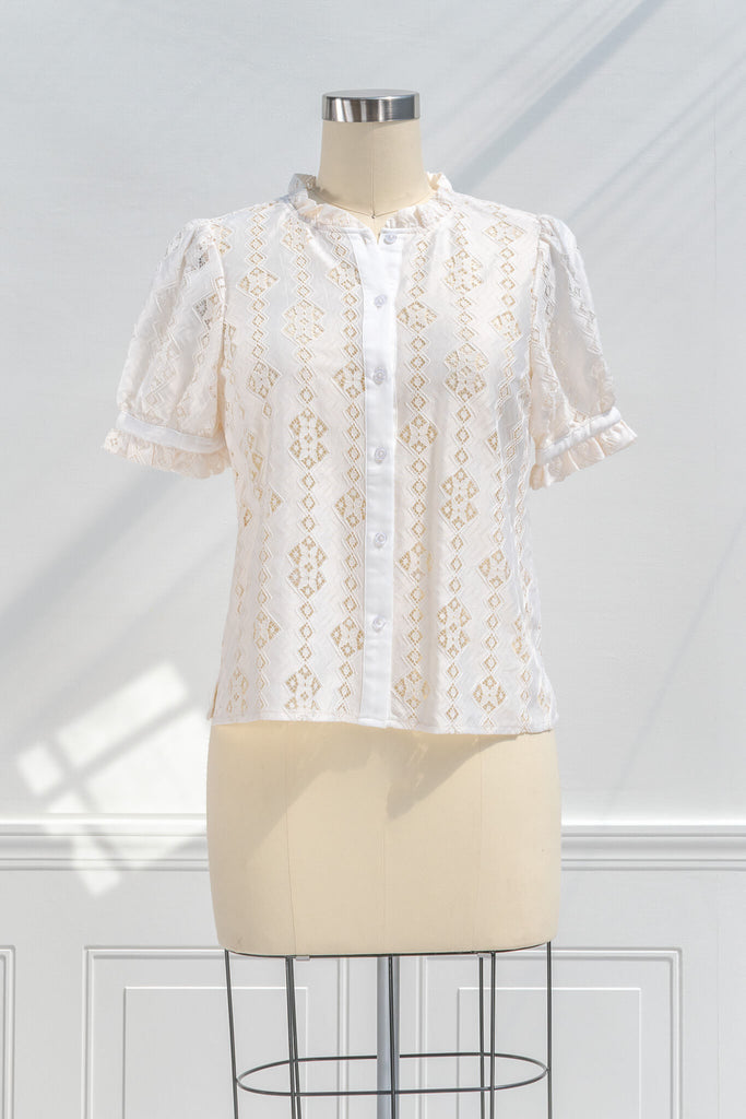 feminine blouses for work - a cottagecore inspired women's blouse with buttondown front, ruffle neck, short sleeves and lace detail. front view. amantine.