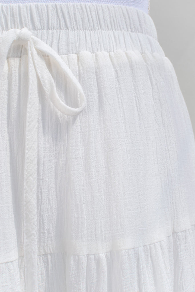 cottagecore outfits - a long white maxi skirt. cottage core. up close fabric view. 