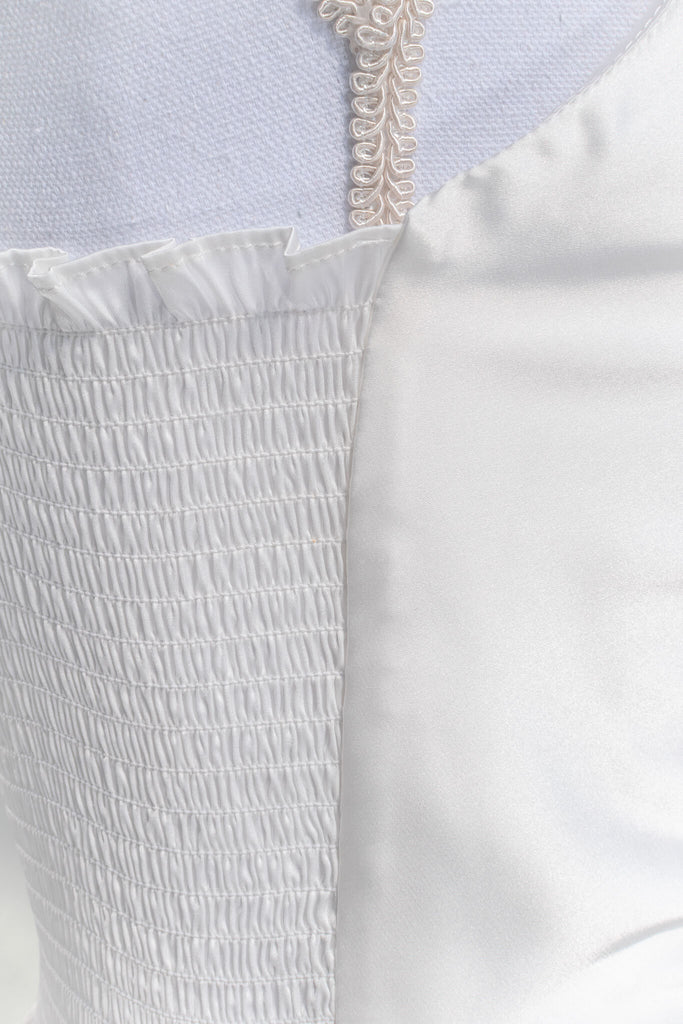 cottagecore outfits - a basic and elegant slip top in white satin. satin fabric view. amantine.