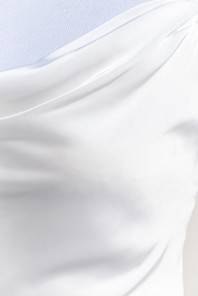 cottagecore outfits - a basic and elegant slip top in white satin. satin fabric view. amantine.