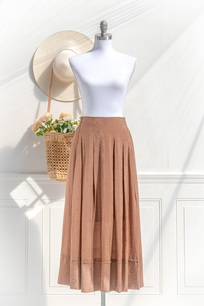 brown cottagecore skirt for fall. long skirt in sikly material a line. front view. french feminine style. 