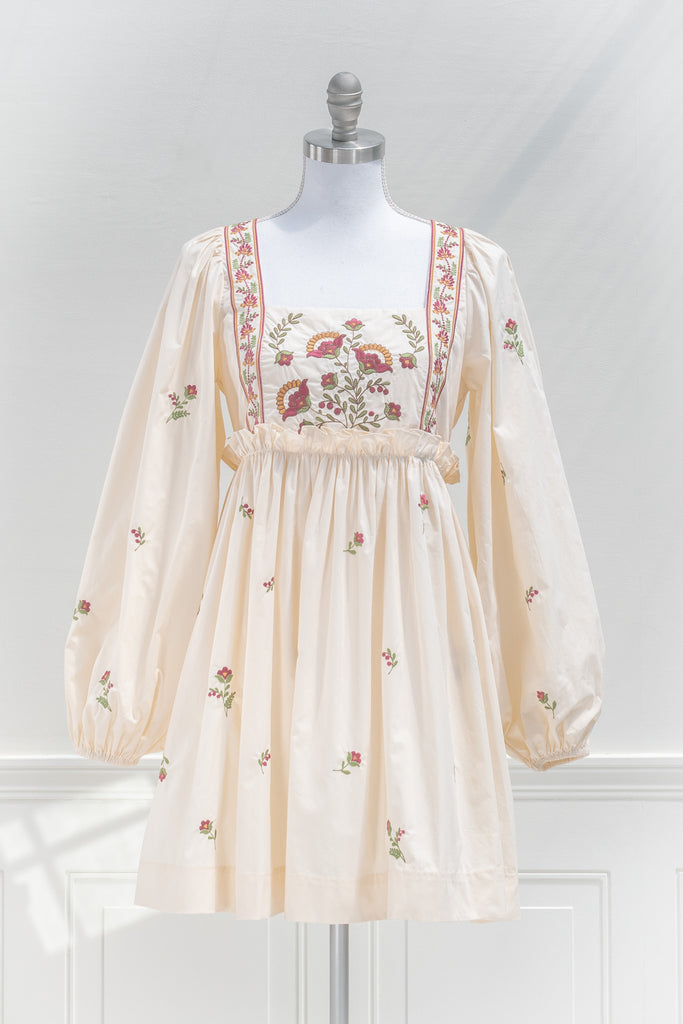 cottage core dress. a square neckline, long sleeve, embroidery detail cottagecore dress. front view. amantine. 