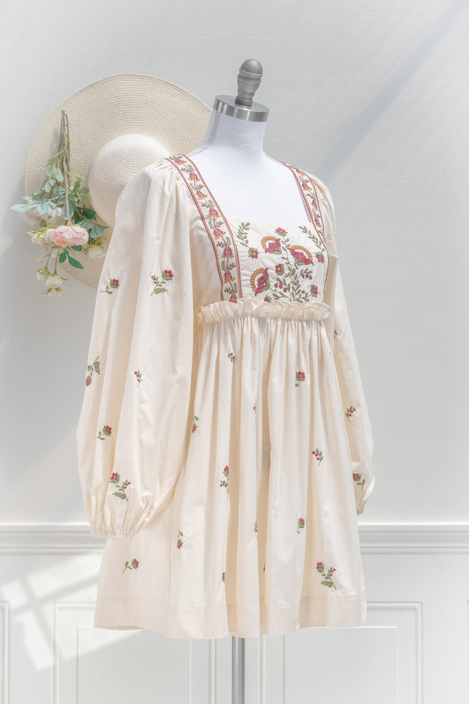 cottage core dress. a square neckline, long sleeve, embroidery detail cottagecore dress. side view. amantine. 
