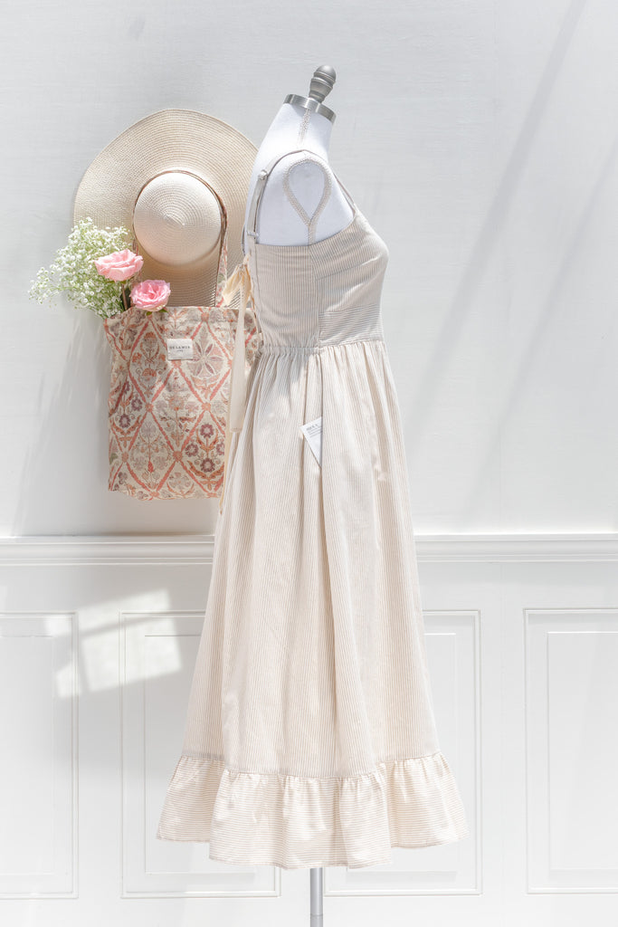 cottagecore dress for fall. cute feminine and romantic style french dress. amantine dresses. side view. 