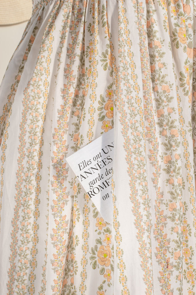 cottagecore dress with square neckline, puff sleeve, regency style, maxi length. Featuring a classic French vintage beige floral print. Front view. Amantine.