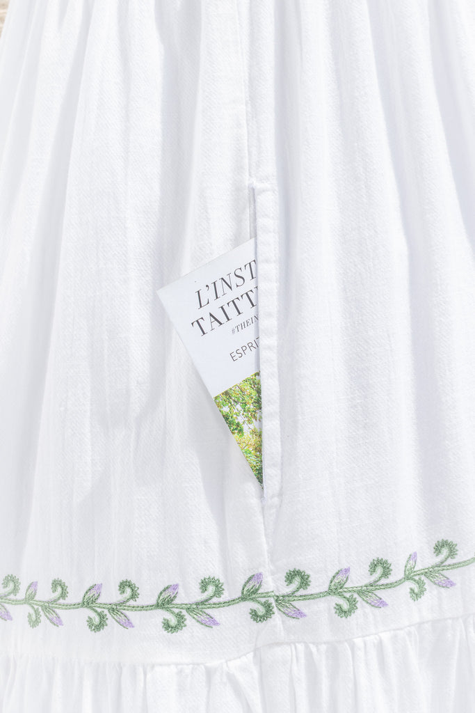 pocket detail of pretty cottagecore dress. 
