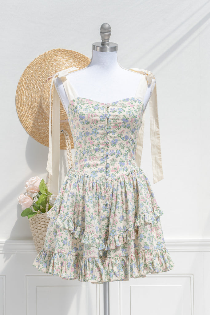 mini cottagecore floral dress - a cute mini dress with blue, pink, and green floral pattern. front view. amantine. 