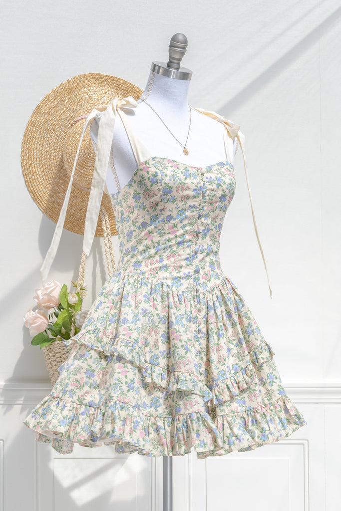 mini cottagecore floral dress - a cute mini dress with blue, pink, and green floral pattern. 3/4 side view. amantine. 