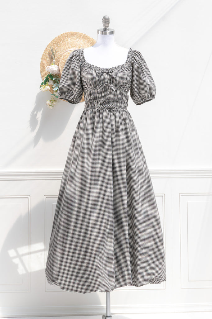 Amantine black-ivory gingham puff-sleeve midi dress with ruched sweetheart neckline, double-shirred waist, and bubble skirt — front view