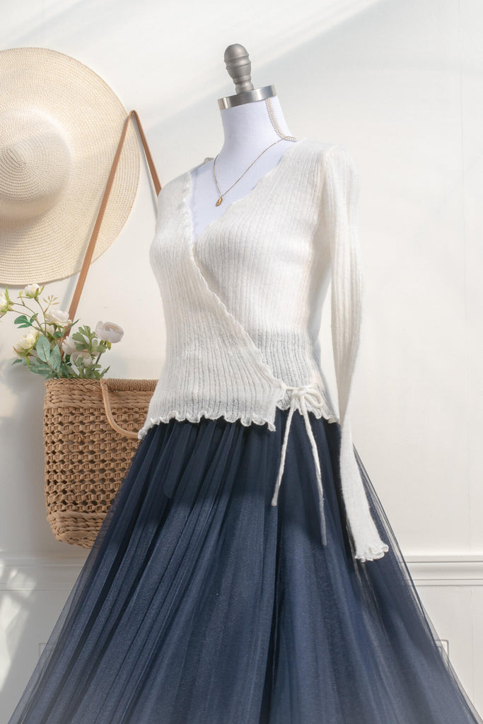 cottagecore outfits with long blue skirt and feminine cottage core top.