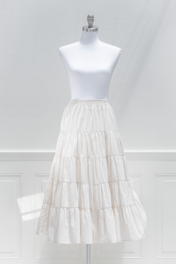 long skirts - a long skirt in a tiered cut, with striped fabric and off white cotton. front view. 