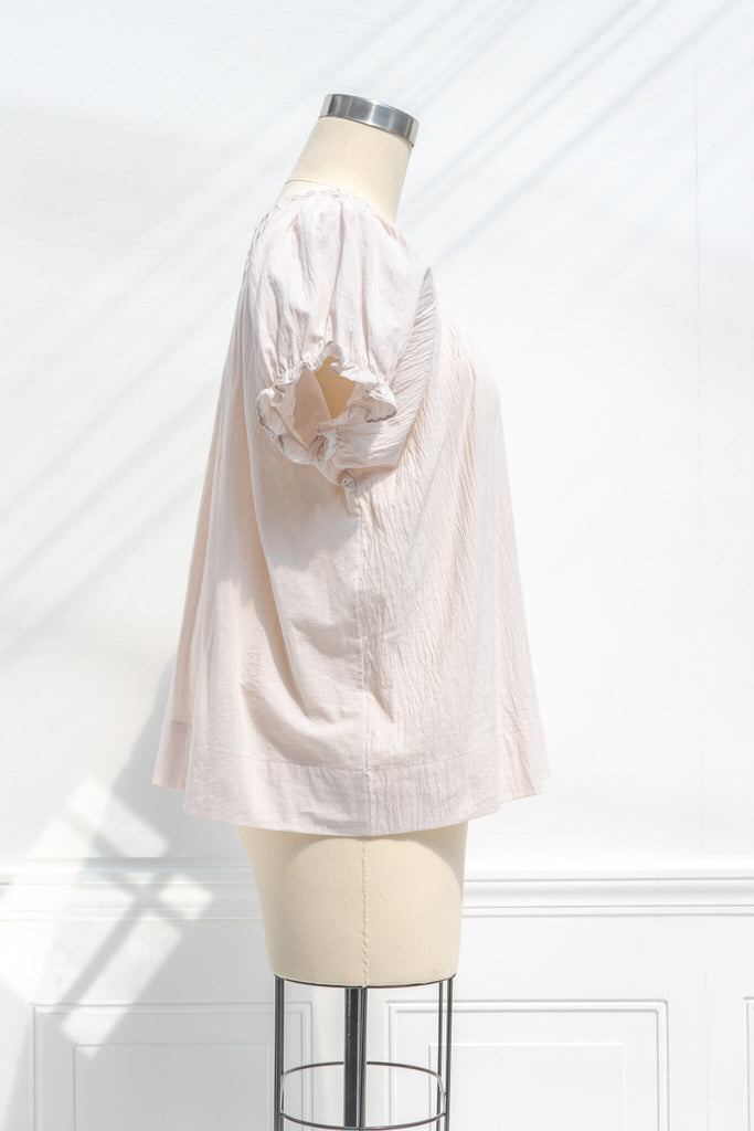 cottagecore outfits - a french inspired neutral cotton blouse for a cottagecore style outfit. side view. amantine. 
