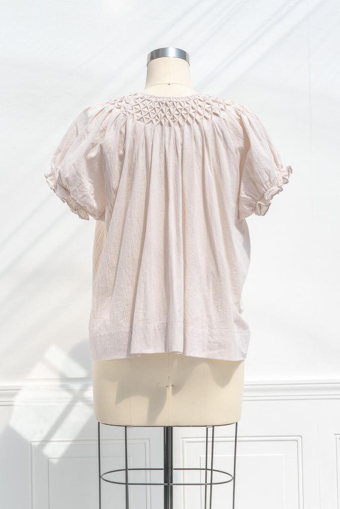 cottagecore outfits - a french inspired neutral cotton blouse for a cottagecore style outfit. back view. amantine. 