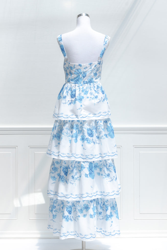 cotton maxi dresses - a blue floral and tiered dress. back view. amantine. 