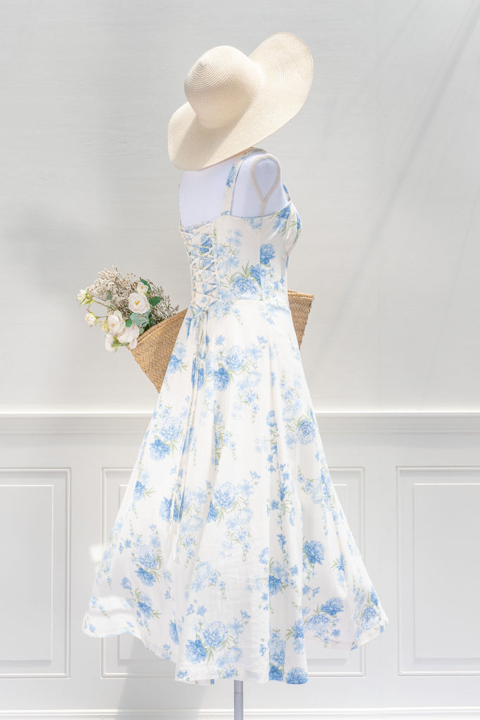 cute feminine cottagecore dress in blue floral detail. 