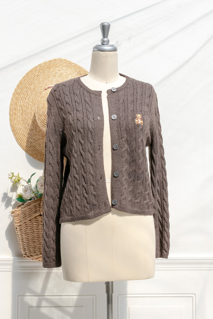 opened cardigan buttondown showing buttons. 
