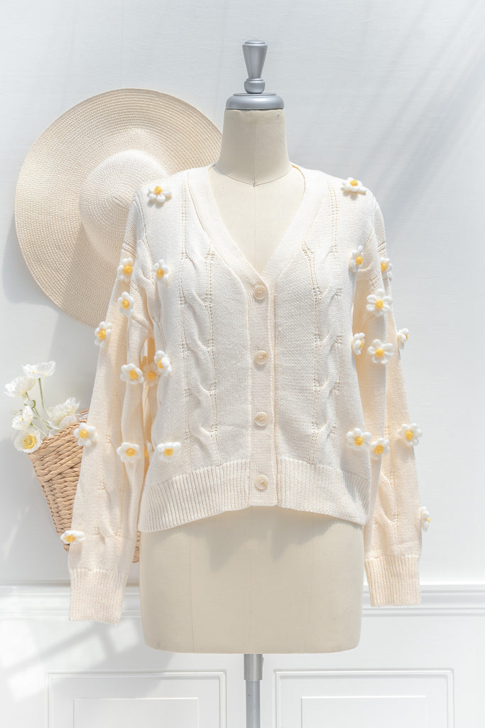 cute sweaters for fall. back to school outfits. a 3d flower cream cardigan. front view. 