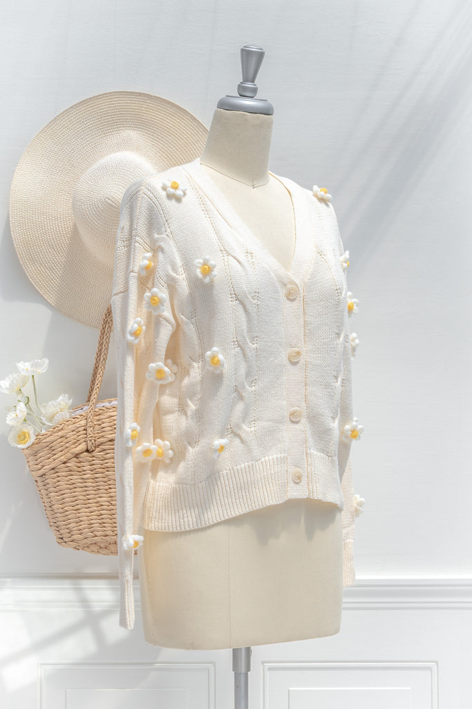 cute sweaters for fall. back to school outfits. a 3d flower cream cardigan. front view. 