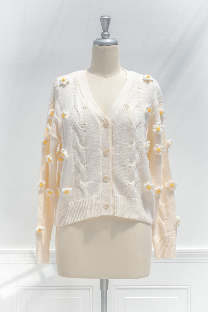 cute sweaters for fall. back to school outfits. a 3d flower cream cardigan. front view. 